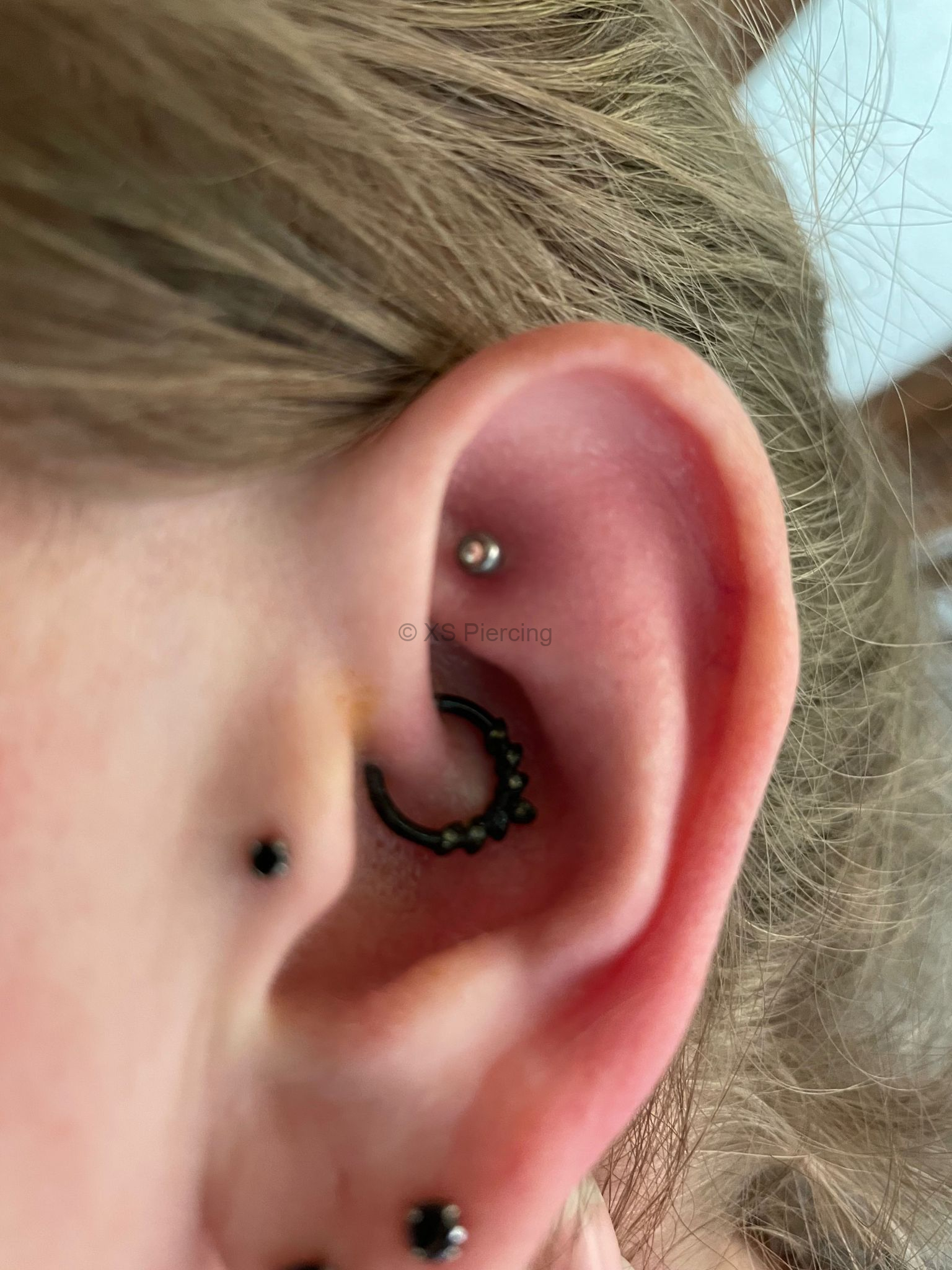 Shen Men Piercing am Ohr